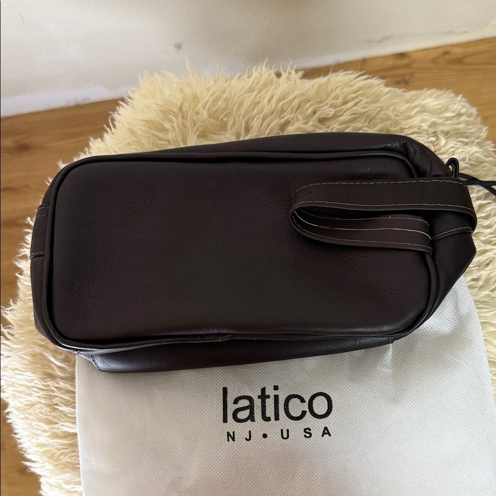 NEW WITH TAGS-LATICO DOPPLER BAG. Deep Brown with top zipper.